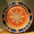 Stoneware bread dish inscribed 'Waste not - Want not' in Gothic Revival style by A.W.N, Pugin for Minton of Stoke-on-Trent, England at Gardiner Museum. Toronto, ON.