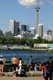 Skyline of Toronto from Ontario with people in foreground. Toronto, ON.