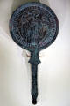 Etruscan bronze mirror back depicting Castor & Pollux flanked by female deities at Royal Ontario Museum. Toronto, ON.
