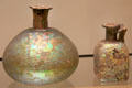 Iridescent glass bottles from Syria or Palestine at Royal Ontario Museum. Toronto, ON.