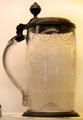 Engraved glass tankard with metal lid from Germany at Royal Ontario Museum. Toronto, ON.