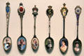 Collection of souvenir spoons with photo portraits & crests of several crowned heads of Europe at Royal Ontario Museum. Toronto, ON.