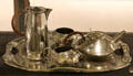 Tudric tea service in pewter with wicker handles by Archibald Knox & made for Liberty & Co by W.H. Haseler at Royal Ontario Museum. Toronto, ON.