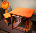 Table & side chair by Frank Lloyd Wright both made for Imperial Hotel in Tokyo, Japan at Royal Ontario Museum. Toronto, ON.