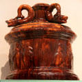 Rockingham-glazed earthenware tobacco jar by Poterie Dion of Quebec at Royal Ontario Museum. Toronto, ON.