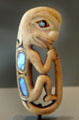 Small Northwest Coast Native amulet carving with shell inserts at Art Gallery of Ontario. Toronto, ON.