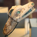 Small Northwest Coast Native amulet carving with shell inserts at Art Gallery of Ontario. Toronto, ON.