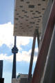 CN Tower seen beyond tabletop building of OCAD University. Toronto, ON.