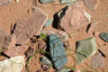 Red & blue rocks on the red sands of PEI. PE.