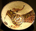 Glazed Persian earthenware bowl with bird from Iran at Montreal Museum of Fine Arts. Montreal, QC.