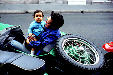 Mother & child in motorcycle side car, Cienfuegos. Cuba.