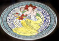 Porcelain plate with symbols of Paris Exposition Universelle by Alphonse Mucha at Mucha Museum. Prague, Czech Republic.