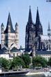Church towers of Gross St. Martin & Cathedral over Rhine. Köln, Germany.