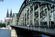 Rail bridge over Rhine & Cathedral. Köln, Germany.