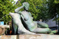 Statue of woman reclining on a sea lion on Mönkeberg Fountain. Hamburg, Germany.