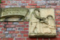 Carving of newspaper seller on "Die Zeit" building. Hamburg, Germany.