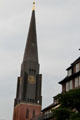 Modern spire atop post-WWII reconstruction of St. Jacobi Church. Hamburg, Germany.