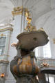 Marble baroque pulpit crowned by Angel of Annunciation sculpted by Otto Lessing at St Michael's Church. Hamburg, Germany.