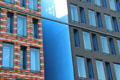 Details of Red. white & gray brickwork on commercial building on Ludwig-Erhard-Straße B4. Hamburg, Germany.