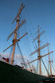Masts & rigging of Rickmer Rickmers museum sailing ship at dusk. Hamburg, Germany.