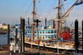 Louisiana Star & historic boat docked on Elbe River. Hamburg, Germany.