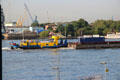 Ronja inland pusher/tug boat pushing barge on Elbe River. Hamburg, Germany.