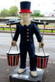 Statue to collect donations on major street. Hamburg, Germany.