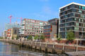 View of Dalmannkai with its variety of modern buildings overlook Elbe River in HafenCity. Hamburg, Germany.