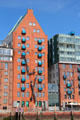 Modern building in Hanseatic brick style on shoreline of Elbe River in Altona borough. Hamburg, Germany.