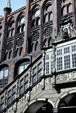 Gothic detail of City Hall with outside Renaissance staircase. Lübeck, Germany.