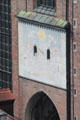 Sundial on side facade over Frauenkirche. Munich, Germany.