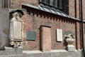 Restored tombstones on southern facade of Frauenkirche. Munich, Germany.