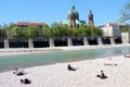 Isar River beside St Lukas church. Munich, Germany.