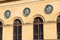 Bronze horse roundel profiles on facade of Residenztheater. Munich, Germany.