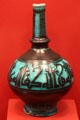 Earthenware vase with religious script from Iran at Five Continents Museum. Munich, Germany.
