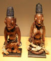 Ibedji twin figure wood carvings from Yoruba culture of Nigeria at Five Continents Museum. Munich, Germany.