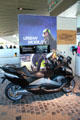 Display of motor bike for urban mobility at BMW World. Munich, Germany.