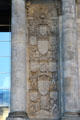 Heraldic reliefs beside doors of German Bundestag. Berlin, Germany.