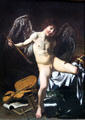 Amor as Victor painting by Caravaggio at Berlin Gemaldegalerie. Berlin, Germany.