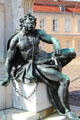 Bronze figure on base of equestrian statue of Friedrich Wilhelm I, Elector of Brandenburg at Charlottenberg Palace. Berlin, Germany.