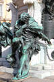 Bronze figure on base of equestrian statue of Friedrich Wilhelm I, Elector of Brandenburg at Charlottenberg Palace. Berlin, Germany.