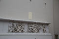 Frieze carving originally around exterior perimeter of Pergamon altar now displayed on interior museum walls in front of the ancient structure at Pergamon Museum. Berlin, Germany.
