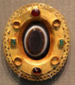 Roman oval brooch with gemstones at Altes Museum. Berlin, Germany