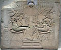Egyptian stone altar relief of Akhenaten, Nefertiti & three of their daughters at Neues Museum. Berlin, Germany.