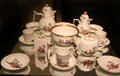 Porcelain coffee & tea service painted with scenes of country life by Meissen at German Historical Museum. Berlin, Germany.