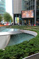 Giant TV screen over landscaping at Sony Center. Berlin, Germany