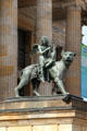 Bronze lyre player riding back of lioness at Konzerthaus Berlin on Gendarmenmarkt. Berlin, Germany.
