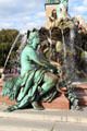 Elbe River figure holding wheat & fruit on Neptune Fountain. Berlin, Germany.