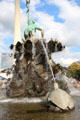 Turtle squirts Neptune on Neptune Fountain before Berlin TV Tower. Berlin, Germany.