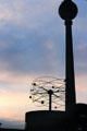 TV antenna tower & International Clock in Alexanderplatz in profile. Berlin, Germany.